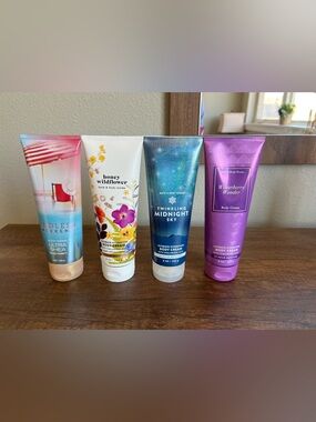 A set of 4 Bath & Body Works body creams.